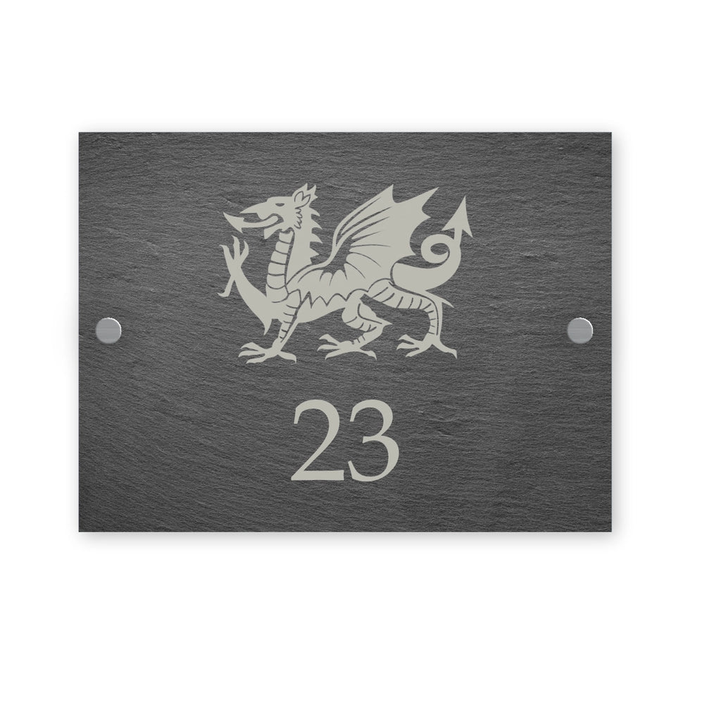 Rectangle slate house sign with illustration of a Welsh dragon and house number and street