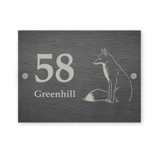 Slate house sign with fox illustration and text on a white background