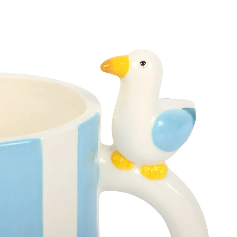 Ceramic mug with a seagull design on a white background