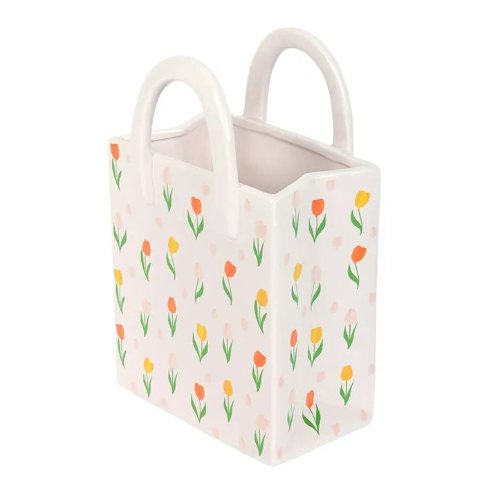 Small rectangular vase with floral design on a white background