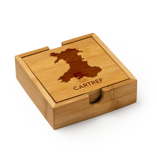 wooden coaster set of 4 in a holder with an engraved welsh map